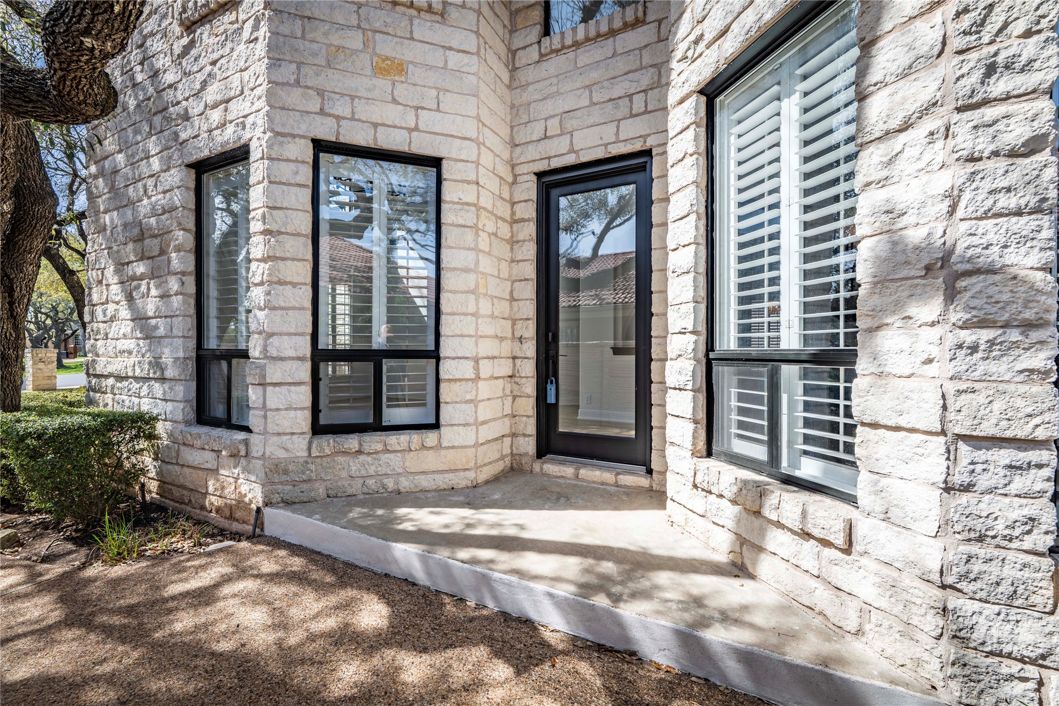 11 Treehaven Lane The Hills, TX 78738 - Photo 4 of 40 a view of entrance of the house with a large windows