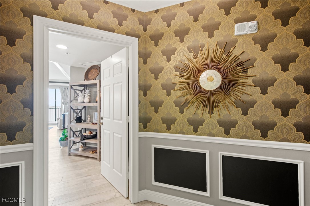 2745 First Street, Unit 1602 Fort Myers, FL 33916 - Photo 3 of 49 a view of a hallway and wooden floor