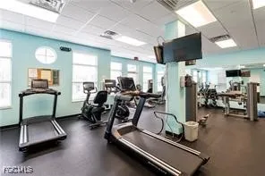 a room with lots of gym equipment