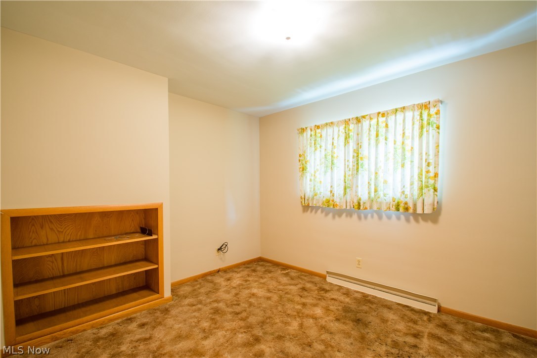 2250 Springfield Center Road Akron, OH 44312 - Photo 13 of 35 Bedroom with built in book shelves could double as an office