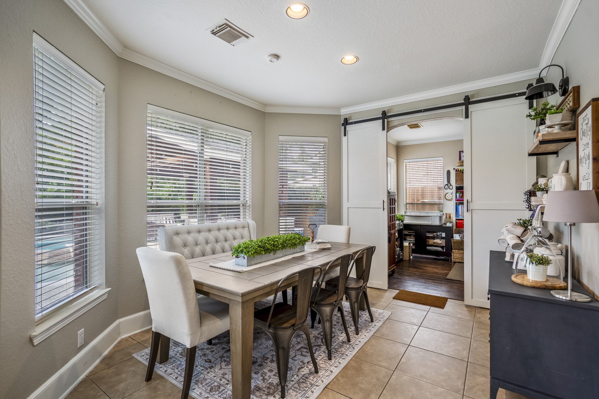 10203 Earlington Manor Drive Spring, TX 77379 - Photo 13 of 50 a dining room with furniture and window