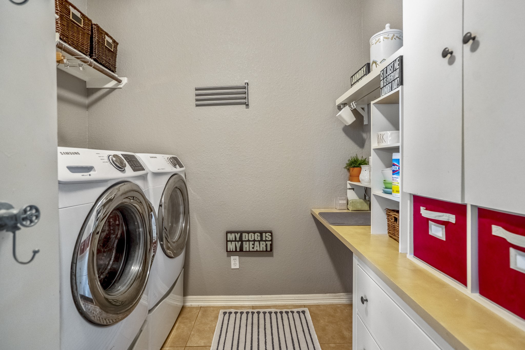 10203 Earlington Manor Drive Spring, TX 77379 - Photo 14 of 50 a view of a hallway with washer and dryer