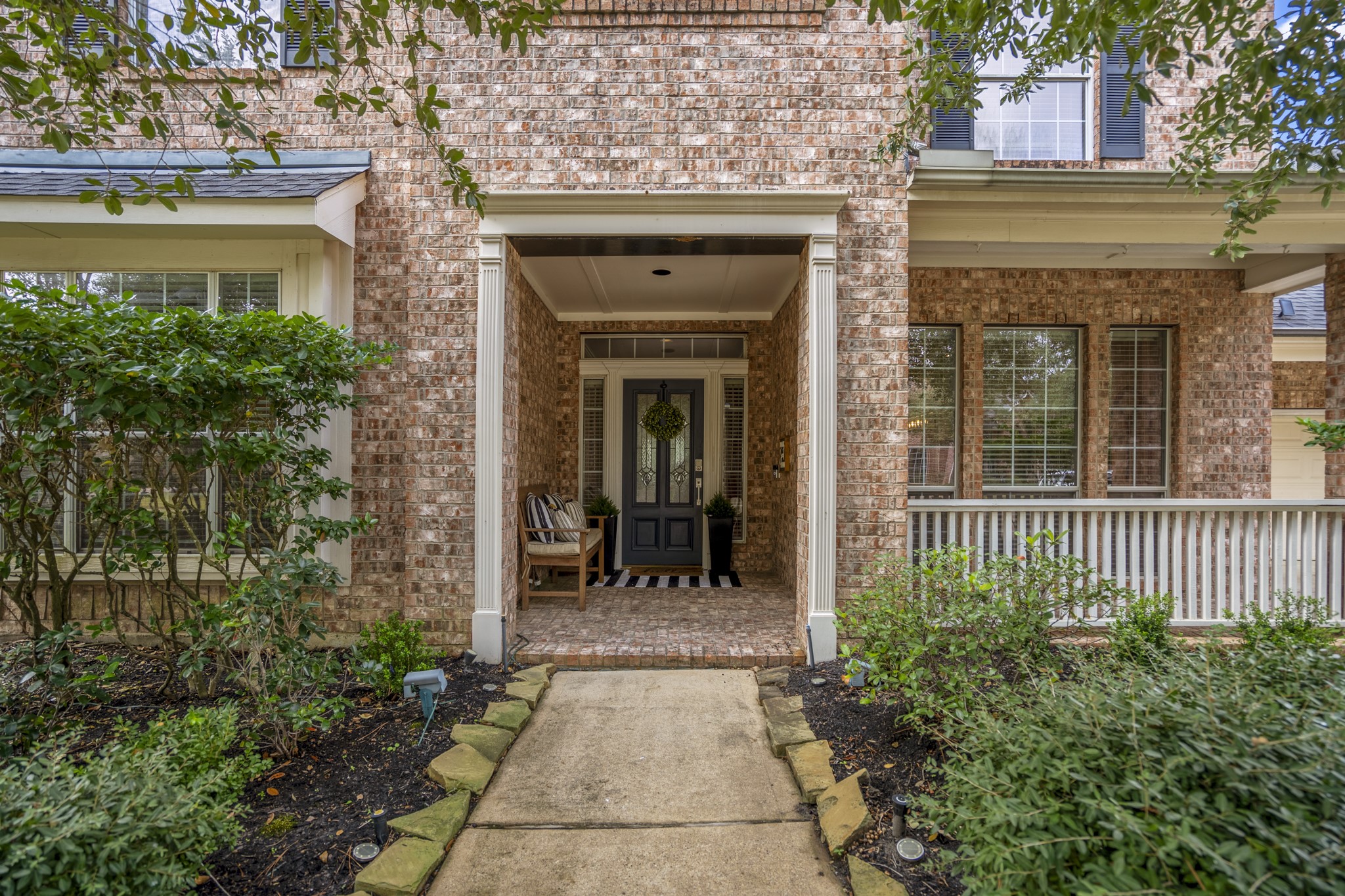 10203 Earlington Manor Drive Spring, TX 77379 - Photo 2 of 50 front view of a house with a porch