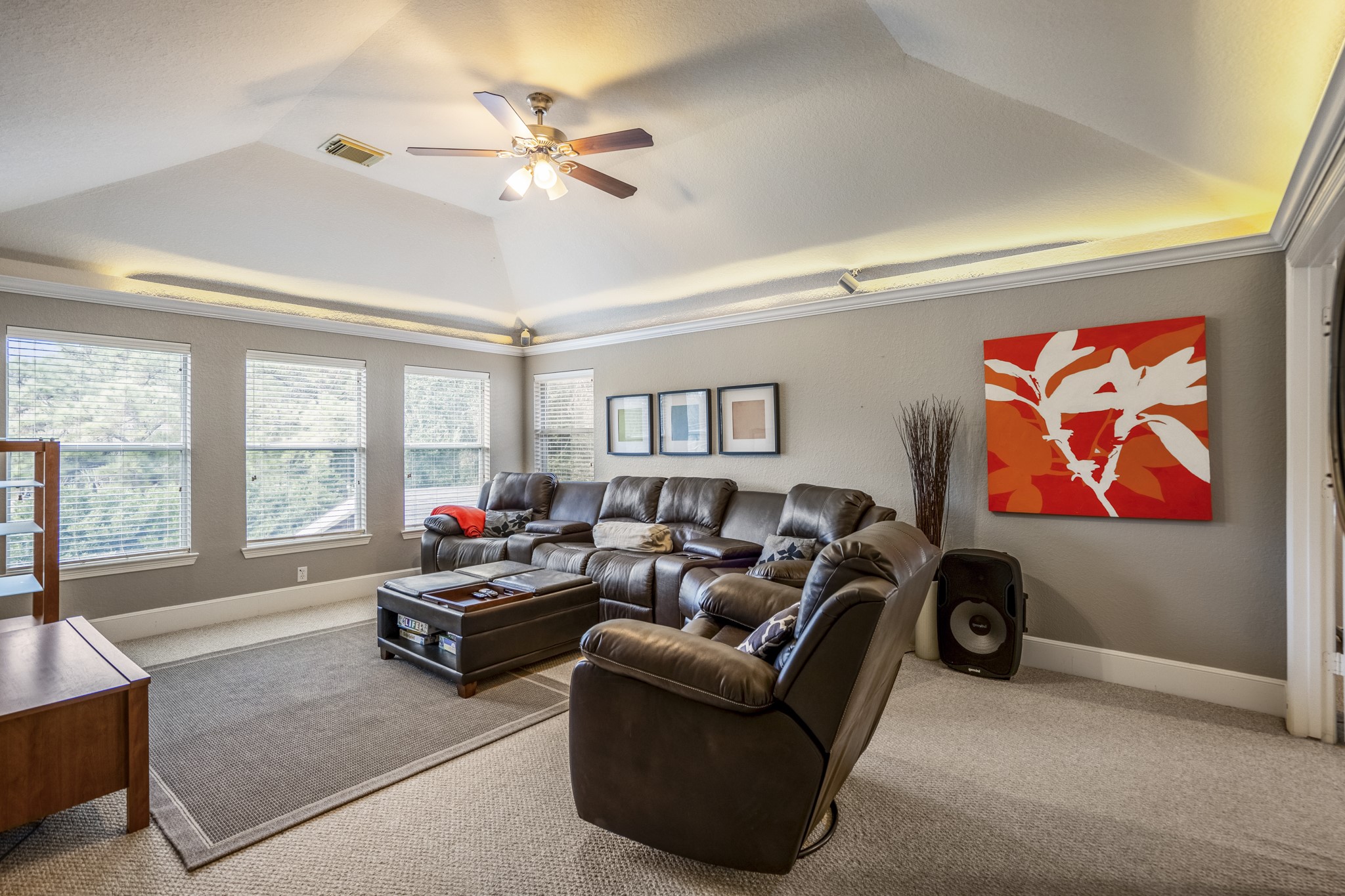 10203 Earlington Manor Drive Spring, TX 77379 - Photo 21 of 50 a living room with furniture ceiling fan and a window