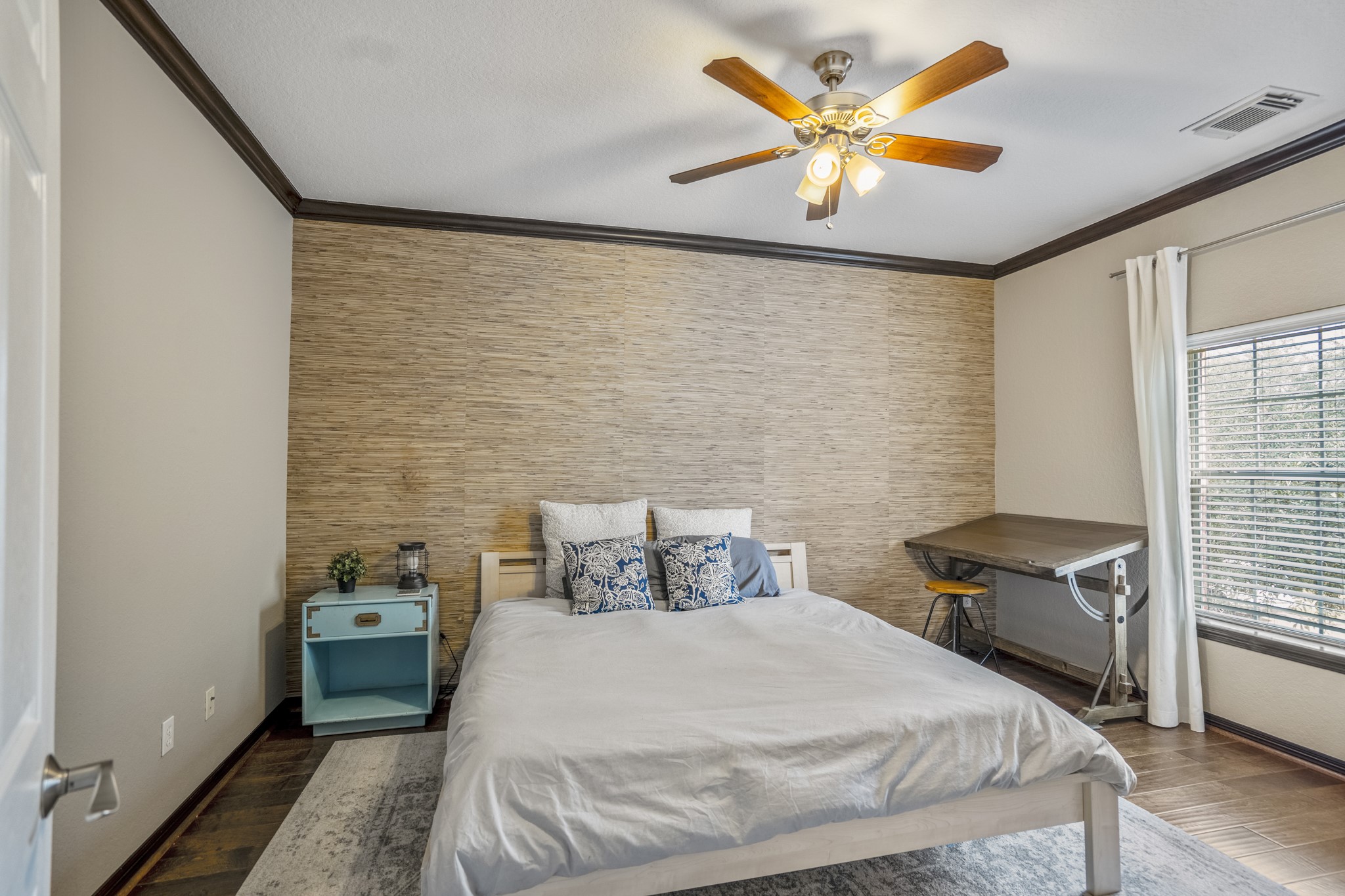 10203 Earlington Manor Drive Spring, TX 77379 - Photo 25 of 50 a bedroom with a bed and a table in it