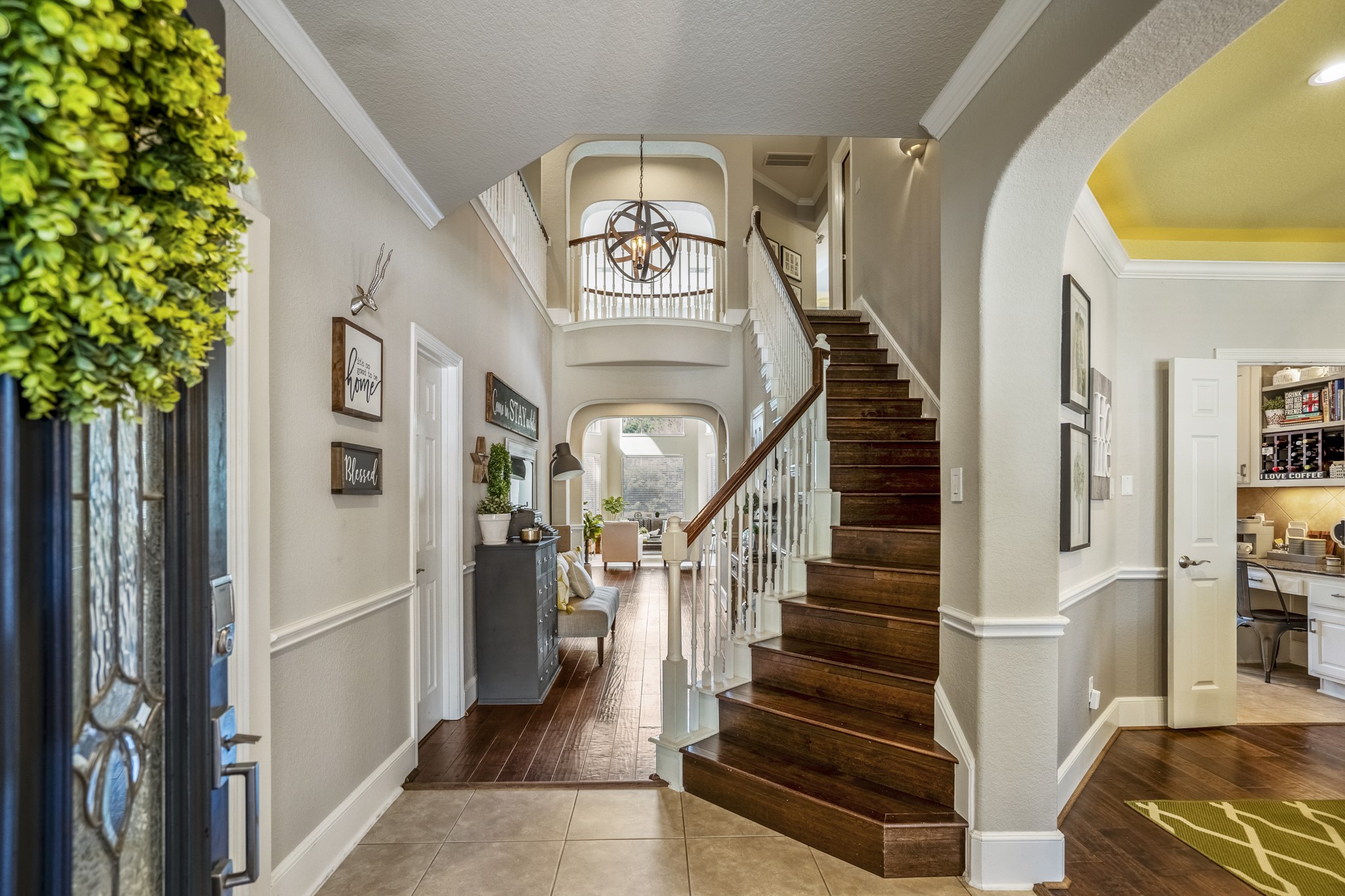 10203 Earlington Manor Drive Spring, TX 77379 - Photo 48 of 50 a view of entryway and hall with wooden floor