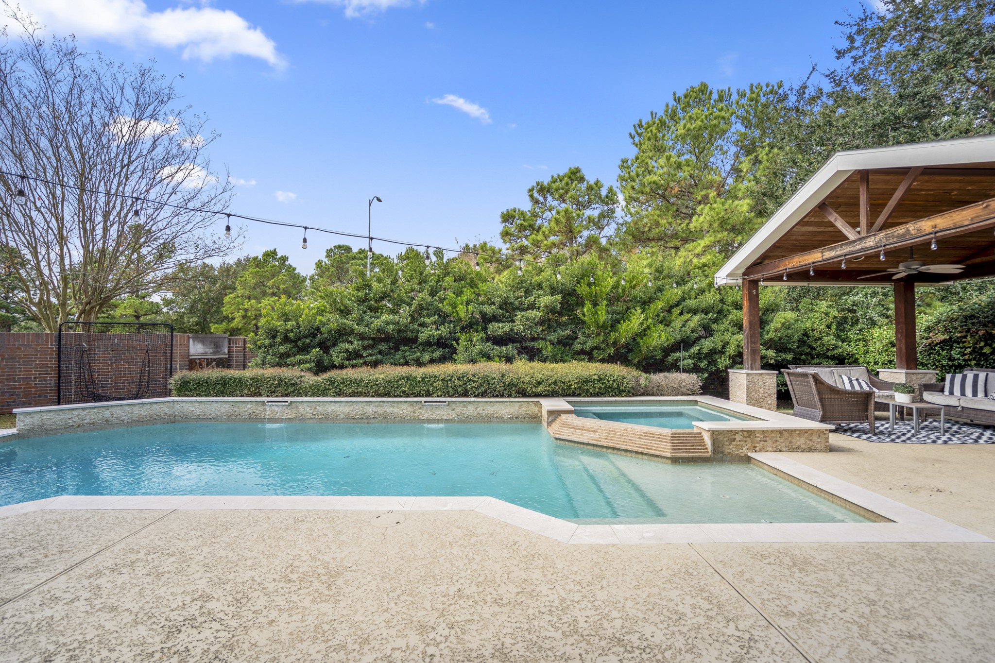 10203 Earlington Manor Drive Spring, TX 77379 - Photo 29 of 50 a view of swimming pool with a patio