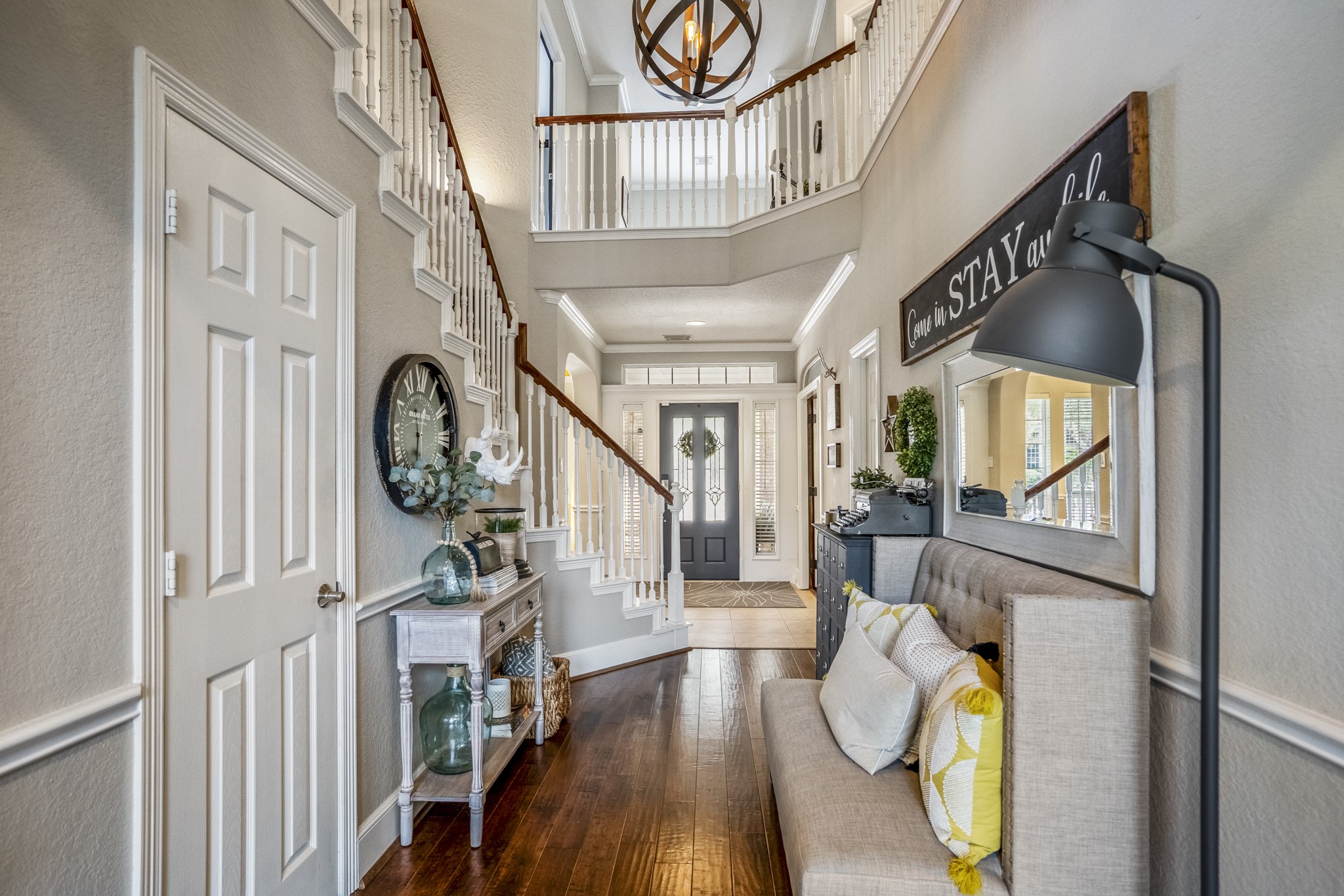 10203 Earlington Manor Drive Spring, TX 77379 - Photo 3 of 50 a view of an entryway with wooden floor