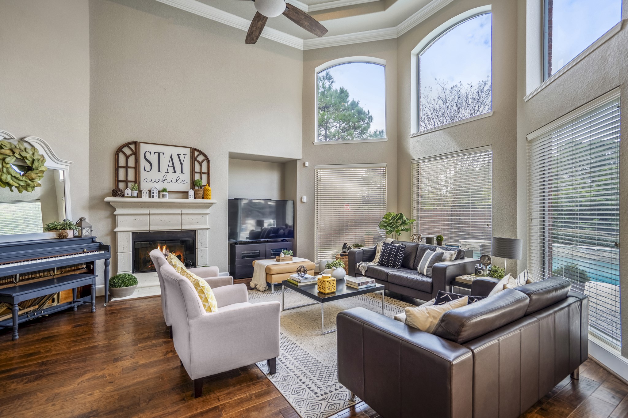 10203 Earlington Manor Drive Spring, TX 77379 - Photo 7 of 50 a living room with furniture and a fireplace