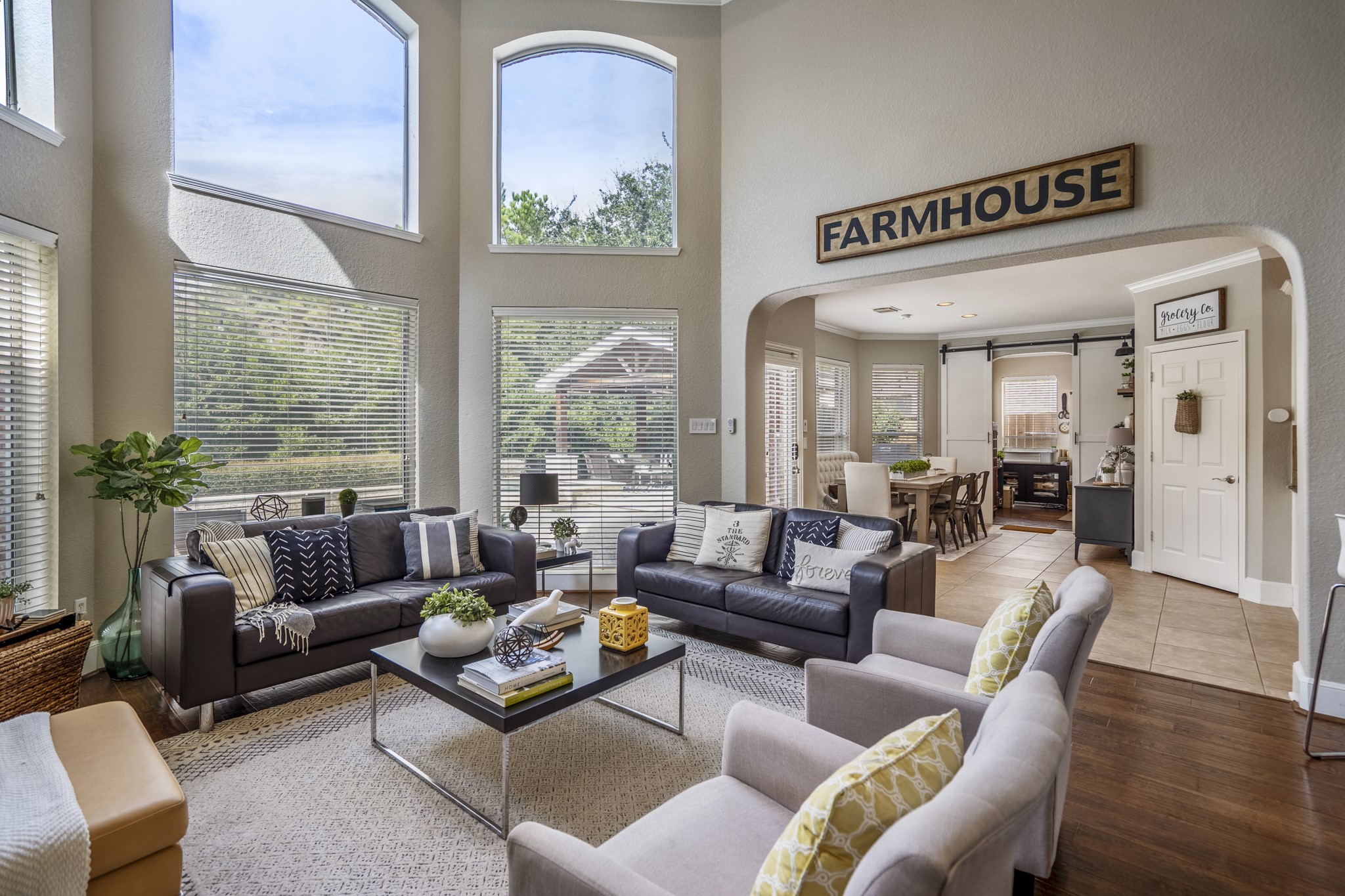 10203 Earlington Manor Drive Spring, TX 77379 - Photo 49 of 50 a living room with furniture and a large window