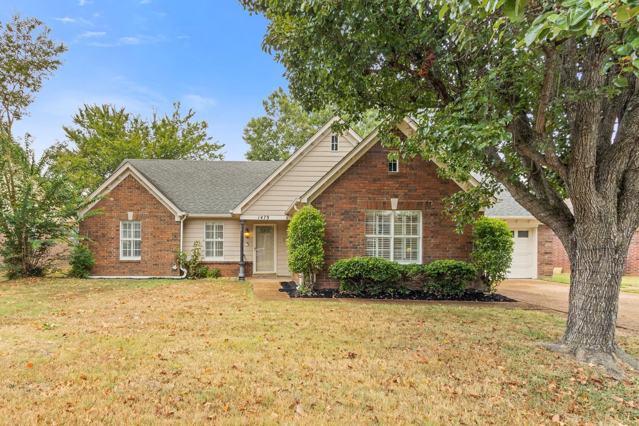 1479 Wolf Ridge Drive Collierville, TN 38017 - Photo 36 of 36 a front view of house with yard and trees around