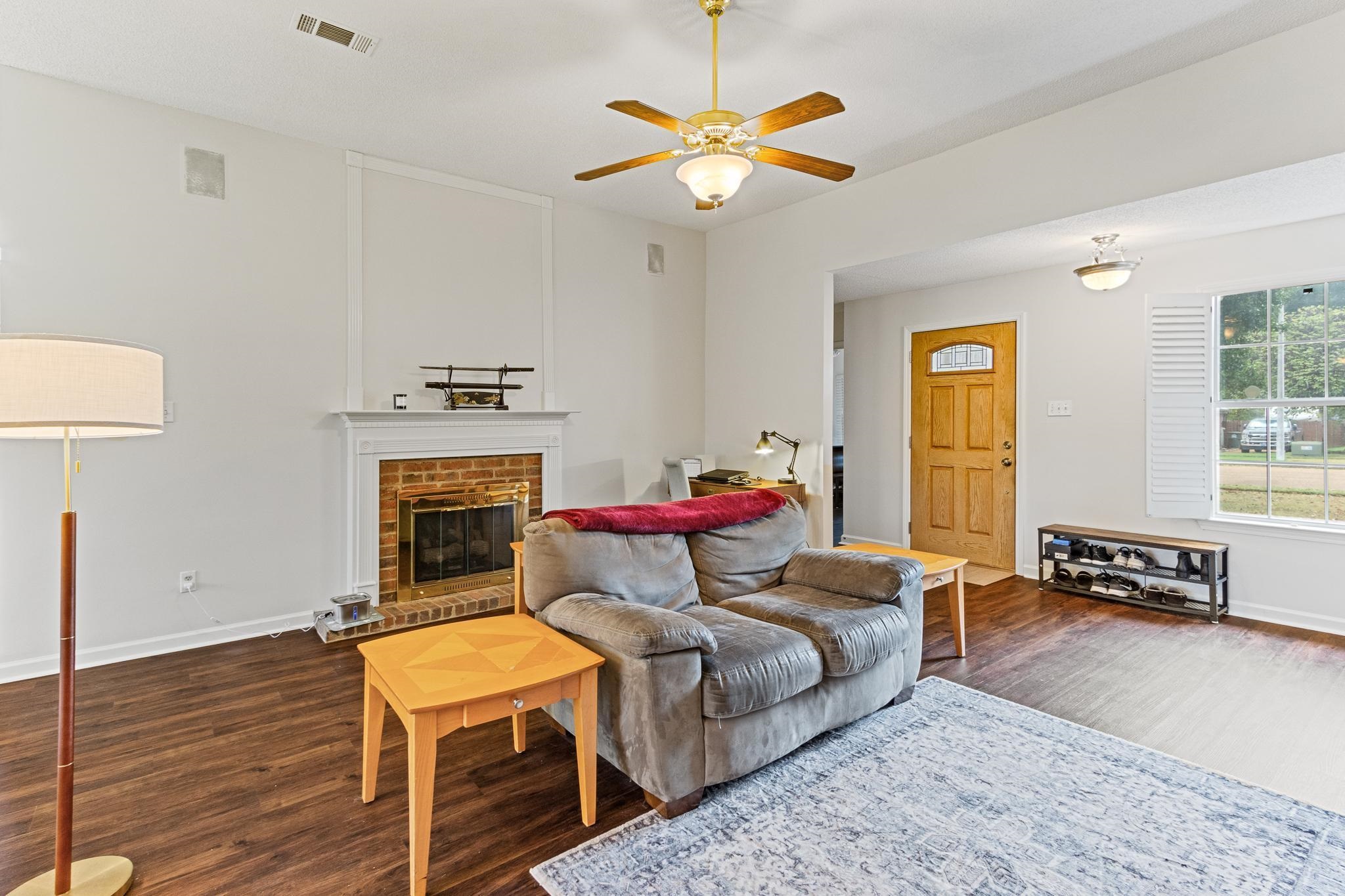 1479 Wolf Ridge Drive Collierville, TN 38017 - Photo 7 of 36 a bedroom with a bed and wooden floor