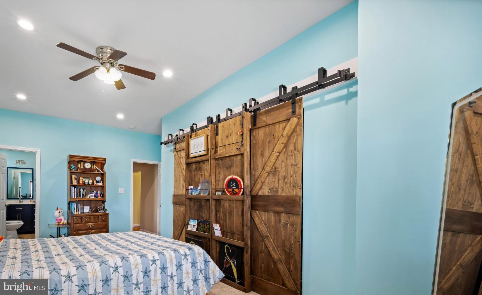 113 West Edgevale Road Baltimore, MD 21225 - Photo 11 of 41 a bedroom with a bed and a chandelier