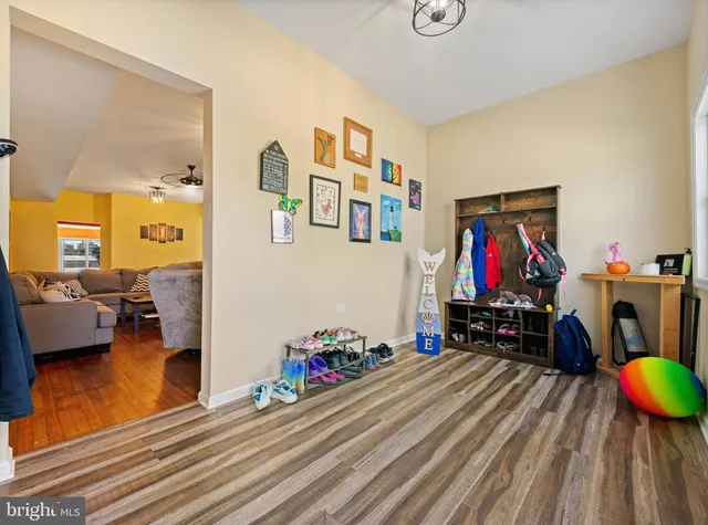 a view of a livingroom with furniture and toys