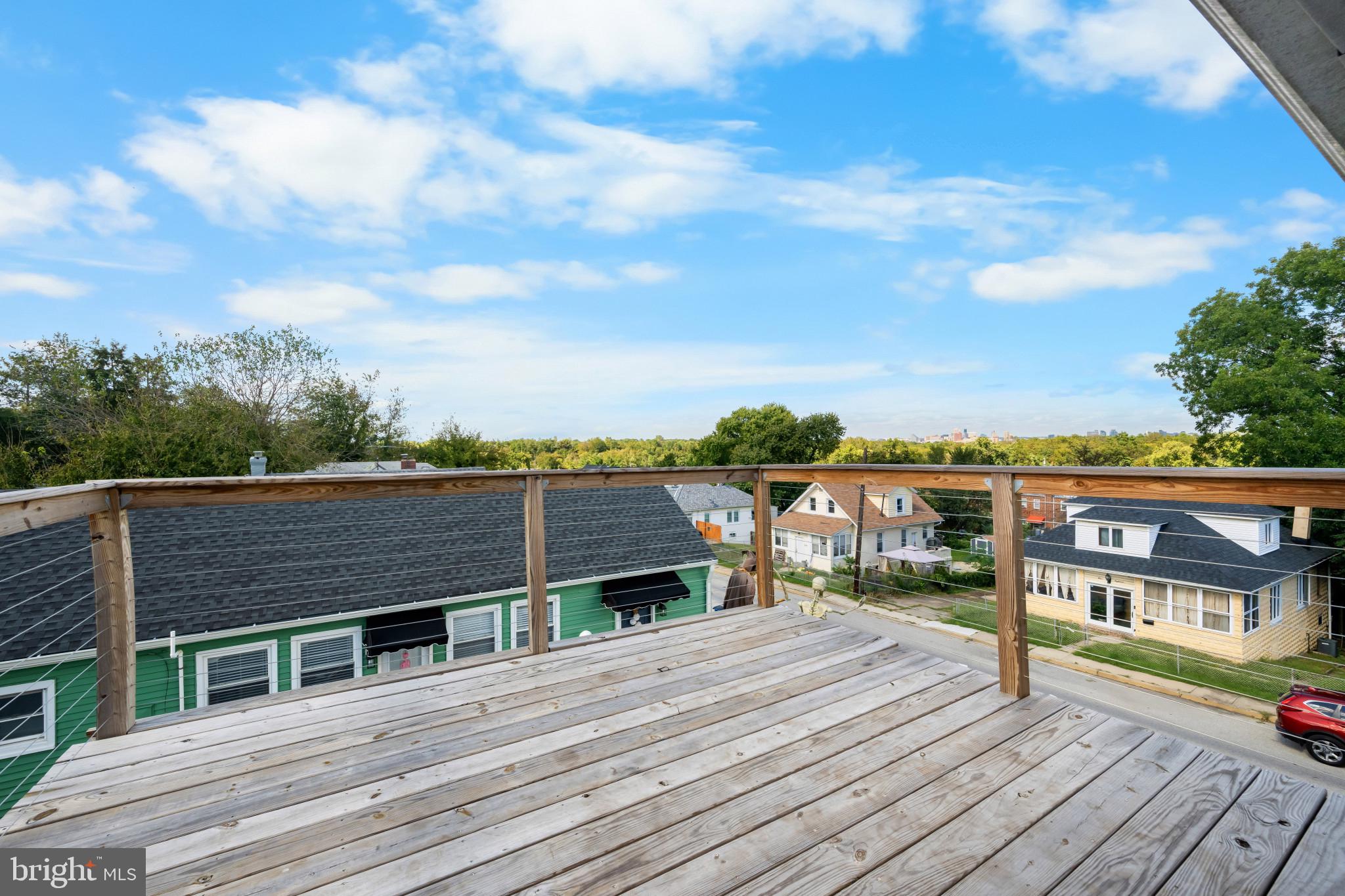 113 West Edgevale Road Baltimore, MD 21225 - Photo 41 of 41 a balcony with city view