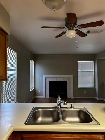 a kitchen with a sink and a microwave
