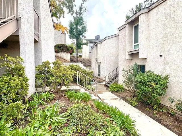 a view of a back yard of the house
