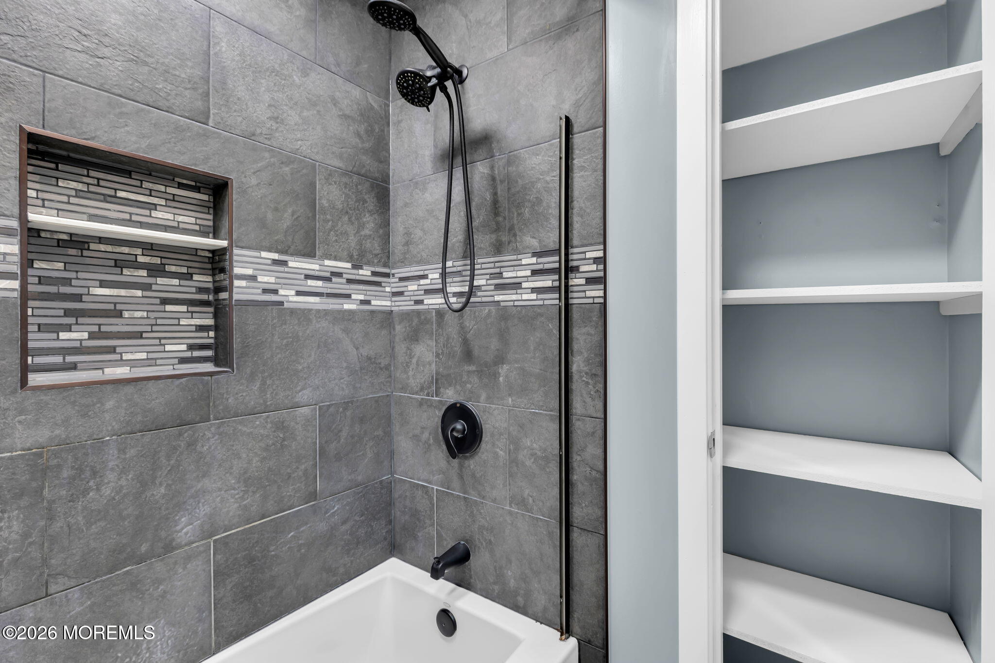 106 Frontier Way Tinton Falls, NJ 07753 - Photo 13 of 22 a bathroom with a shower