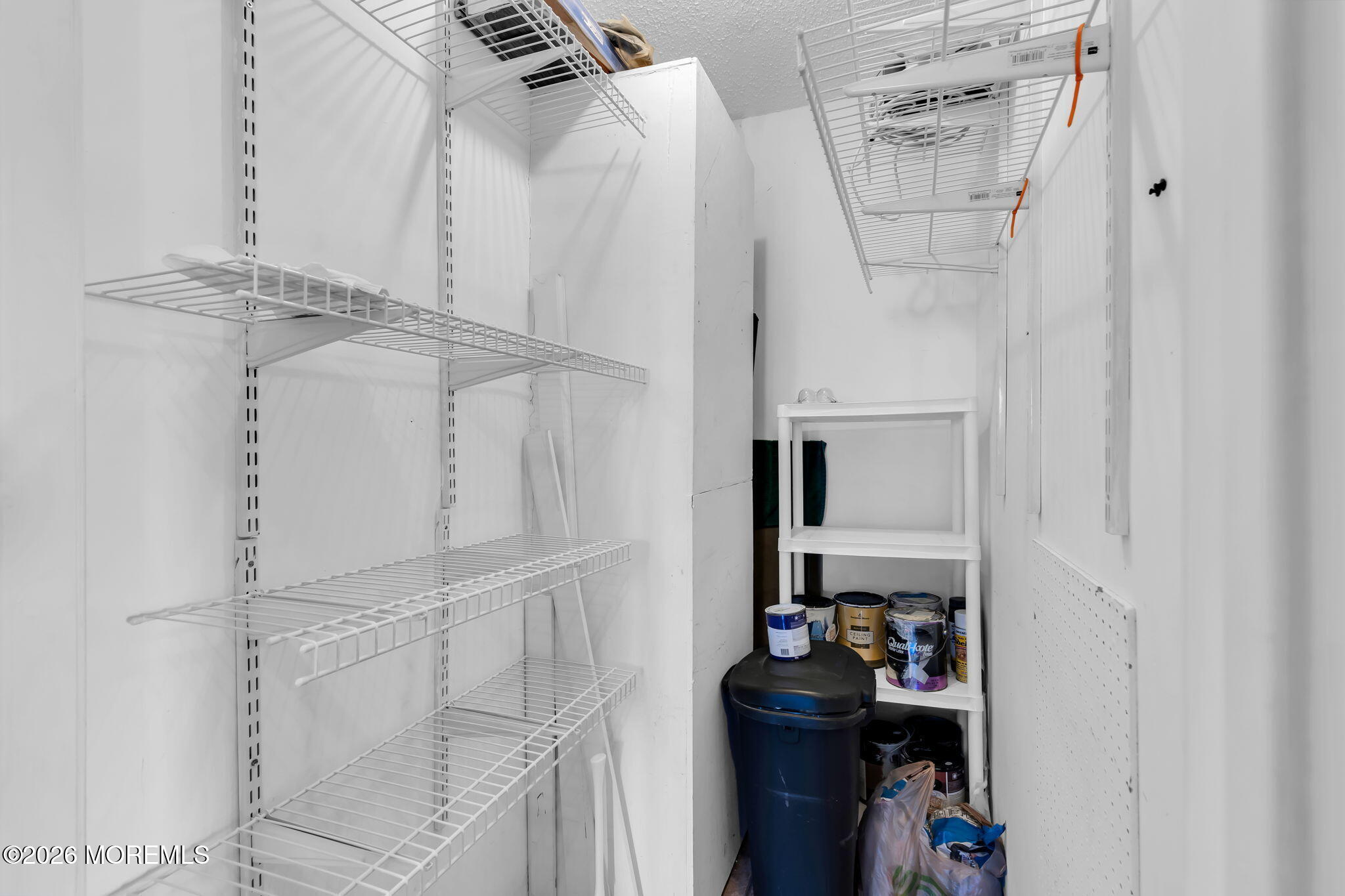 106 Frontier Way Tinton Falls, NJ 07753 - Photo 20 of 22 a view of walk in closet with clothes and shoes