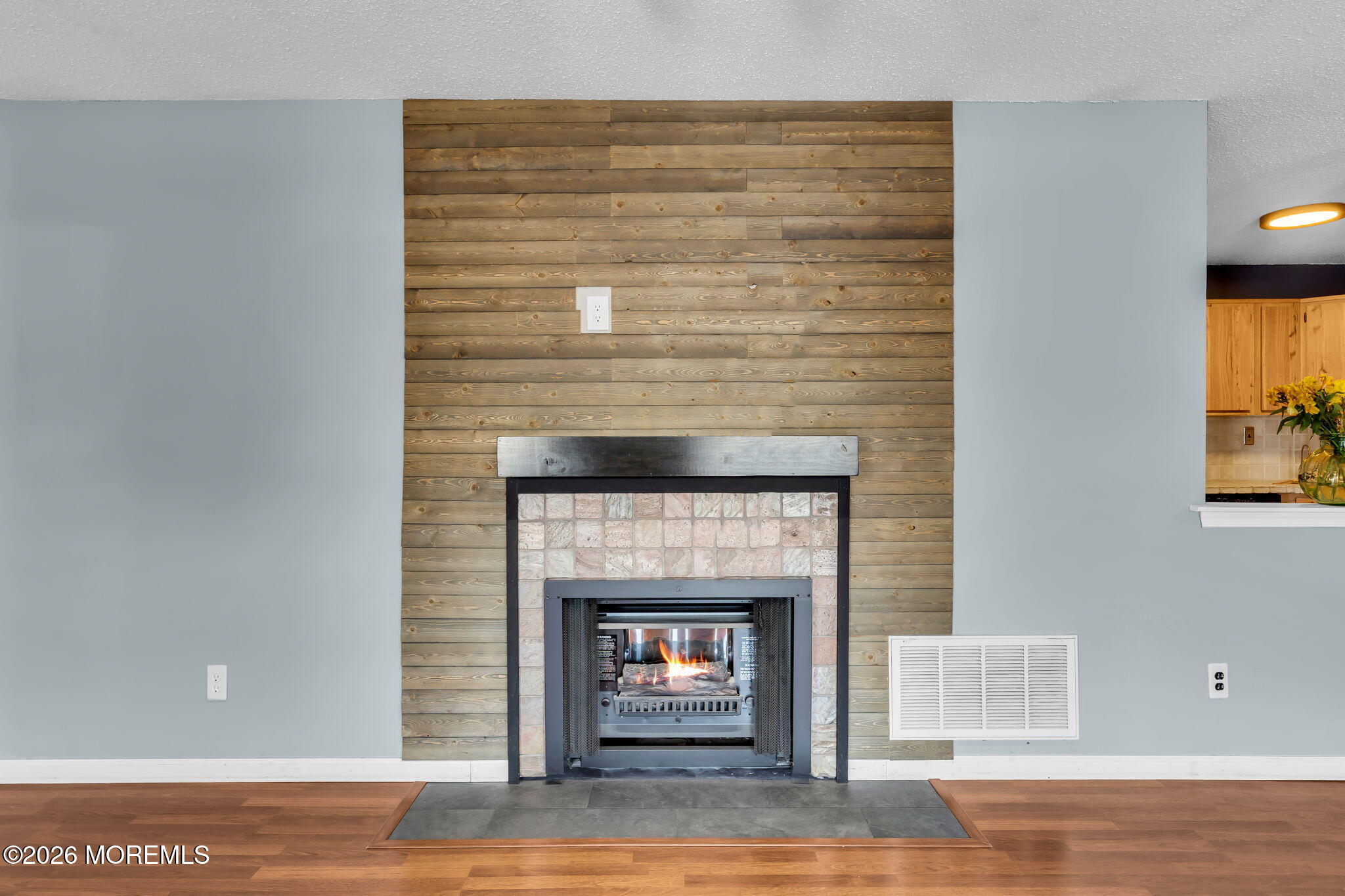 106 Frontier Way Tinton Falls, NJ 07753 - Photo 7 of 22 a living room with a fireplace