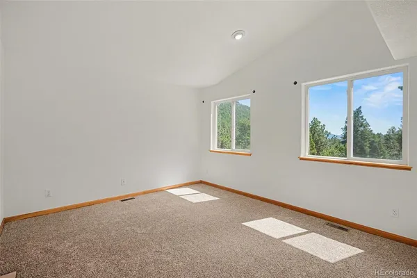 an empty room with windows