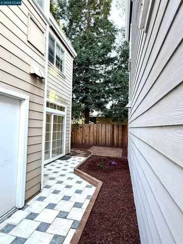 a view of a back yard of the house