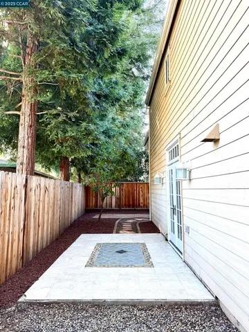 a view of pathway with a house