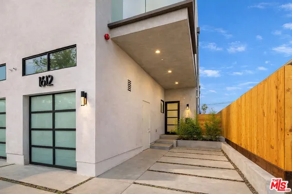 a view of a entryway door front of house
