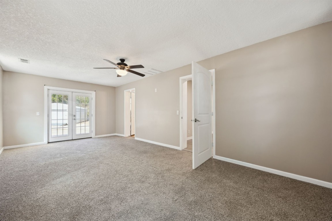87529 Roses Bluff Road Yulee, FL 32097 - Photo 16 of 38 a view of an empty room with a window