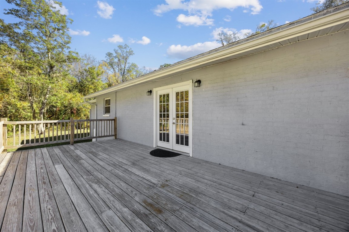 87529 Roses Bluff Road Yulee, FL 32097 - Photo 25 of 38 a view of a house with wooden floor