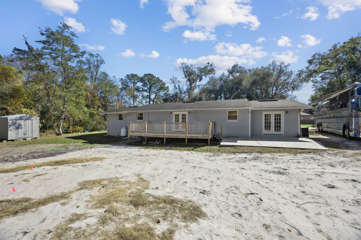 87529 Roses Bluff Road Yulee, FL 32097 - Photo 27 of 38 a backyard of a house