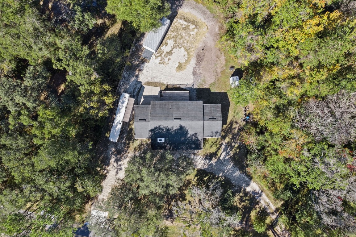 87529 Roses Bluff Road Yulee, FL 32097 - Photo 31 of 38 an aerial view of a house with a yard