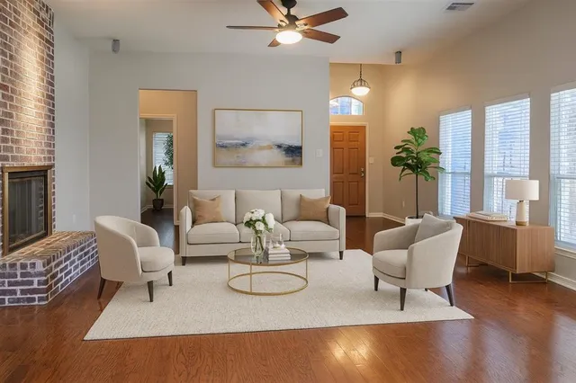 a kitchen with granite countertop a sink stove and cabinets