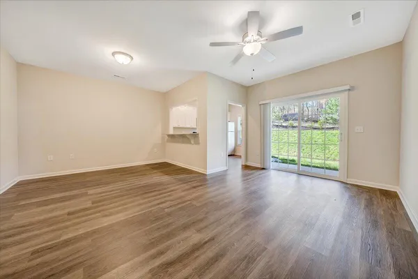 a view of a livingroom with wooden floor