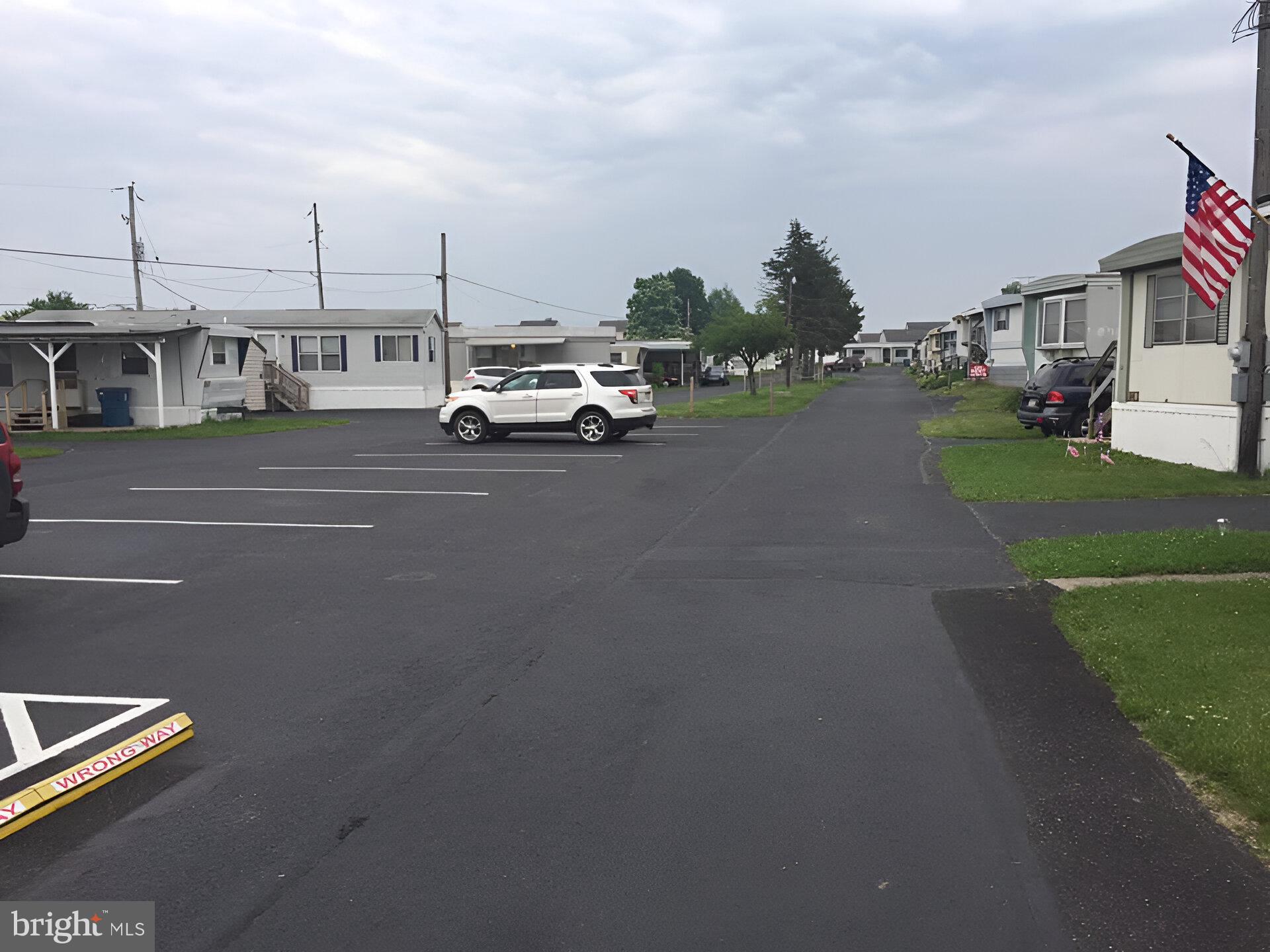 3720 Davidsburg Road, Unit C7 Dover, PA 17315 - Photo 16 of 20 a car parked on the side of the road