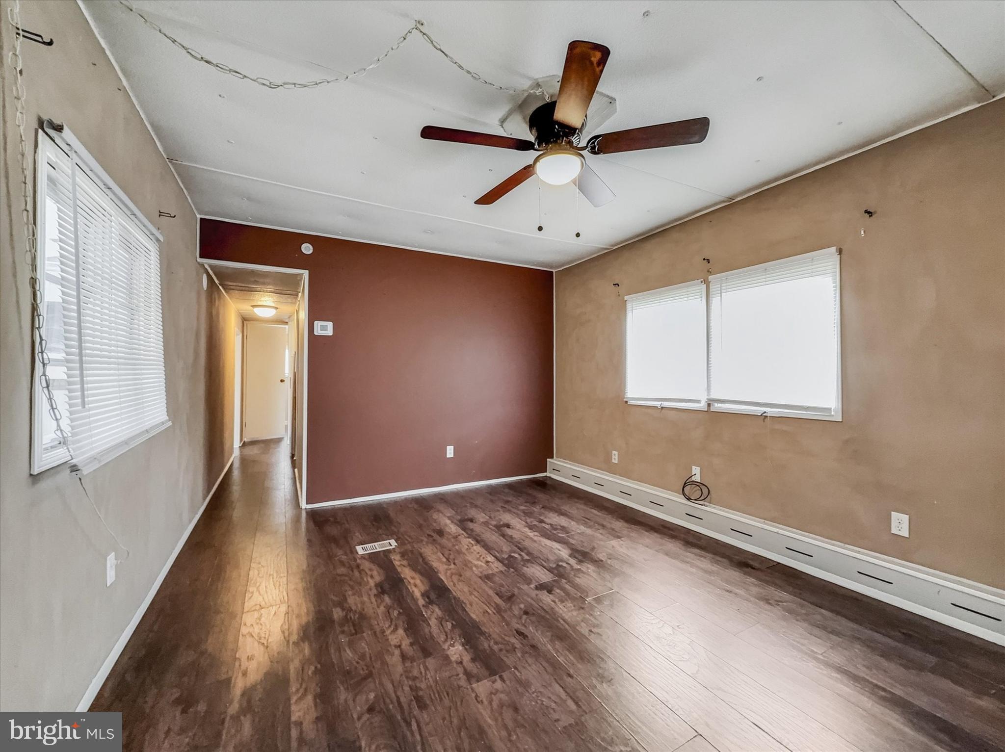 3720 Davidsburg Road, Unit C7 Dover, PA 17315 - Photo 7 of 20 a view of room with window ceiling fan and hardwood floor