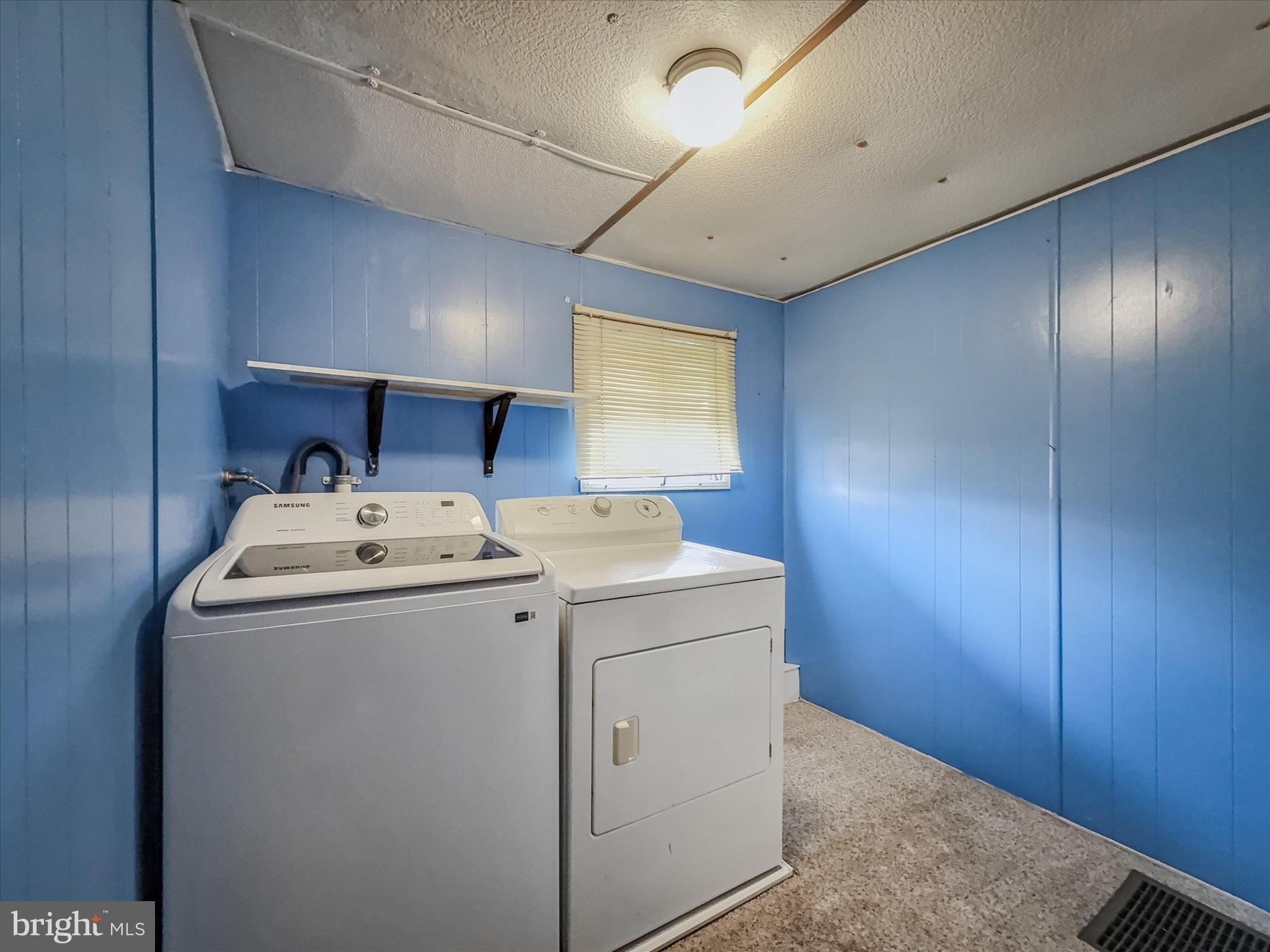 3720 Davidsburg Road, Unit C7 Dover, PA 17315 - Photo 10 of 20 a utility room with dryer and washer
