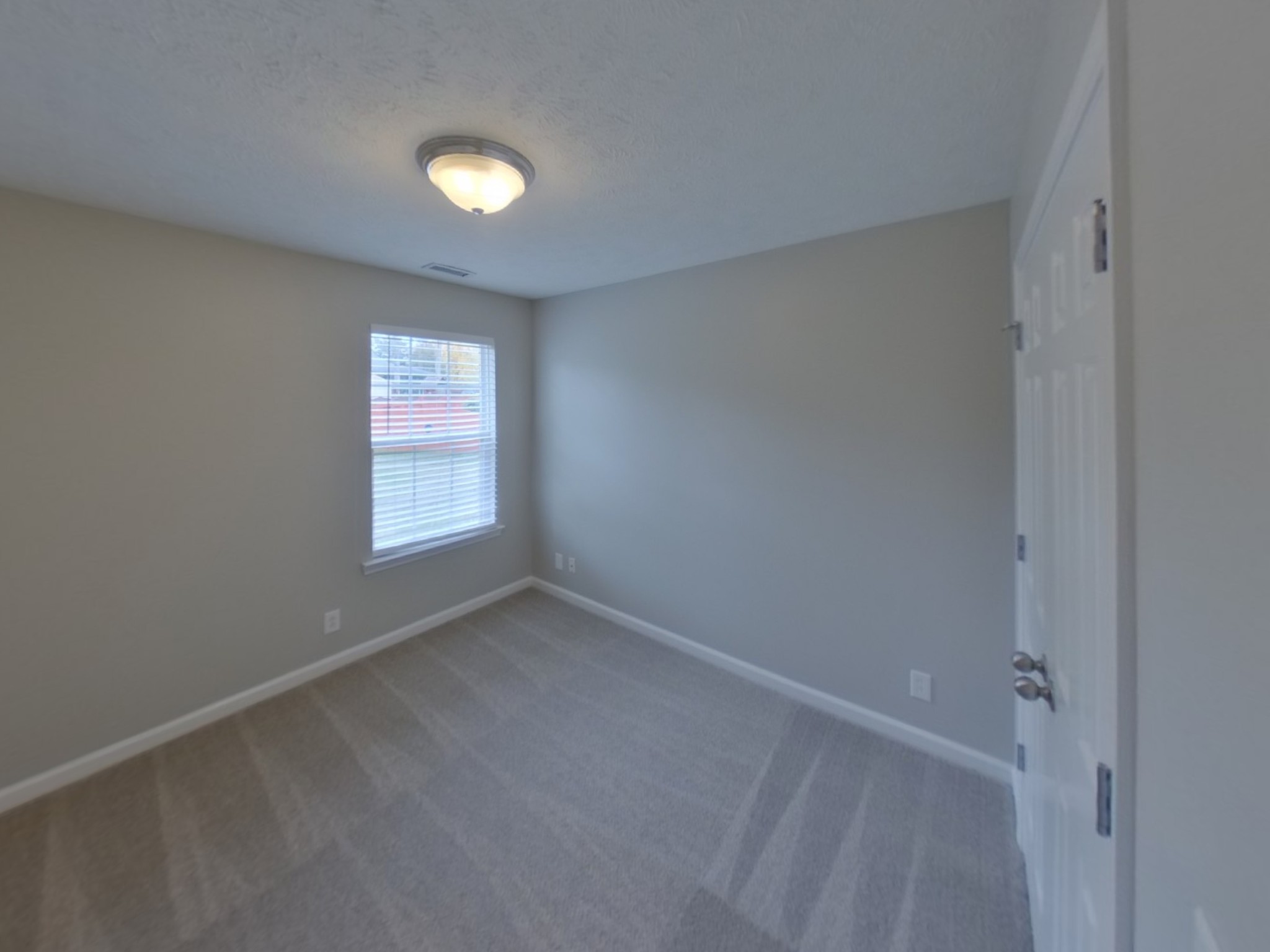 1429 Factors Walk Murfreesboro, TN 37128 - Photo 11 of 17 an empty room with windows and entrance