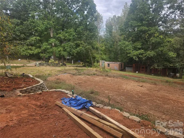 a view of a backyard with of trees
