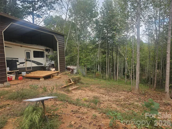 a view of backyard with slide