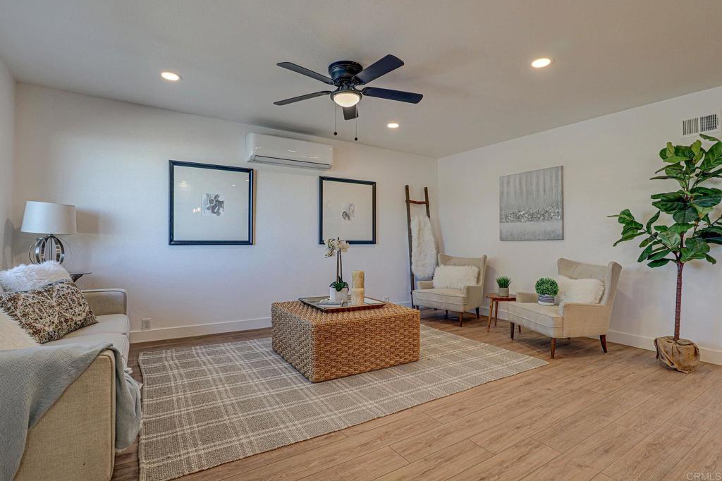 4205 Rene Drive San Diego, CA 92154 - Photo 4 of 24 a living room with furniture and a potted plant