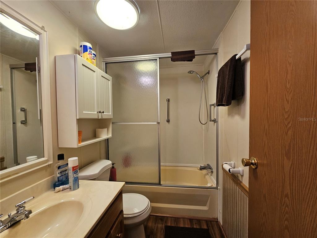 14381 Camp Mack Road Lake Wales, FL 33898 - Photo 20 of 52 a bathroom with a sink toilet and shower