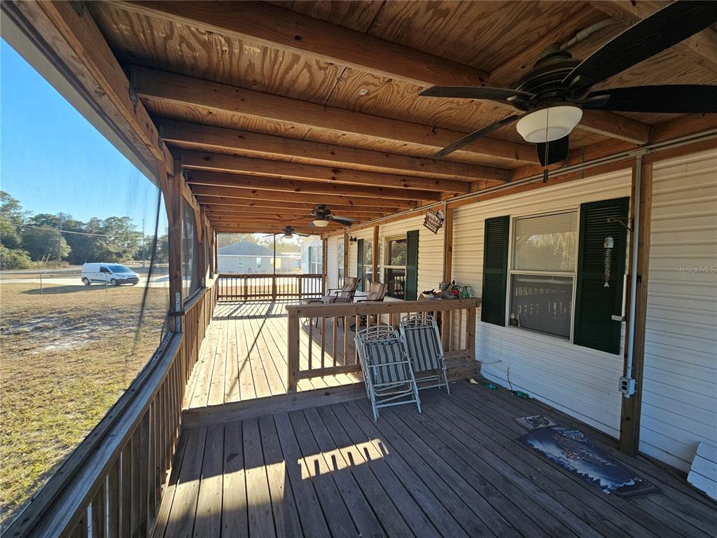 14381 Camp Mack Road Lake Wales, FL 33898 - Photo 23 of 52 a view of balcony with wooden floor
