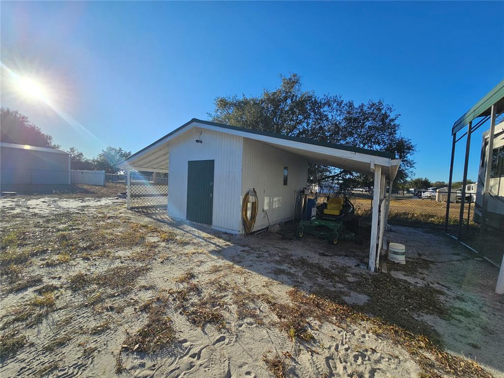14381 Camp Mack Road Lake Wales, FL 33898 - Photo 27 of 52 a view of a house with a backyard