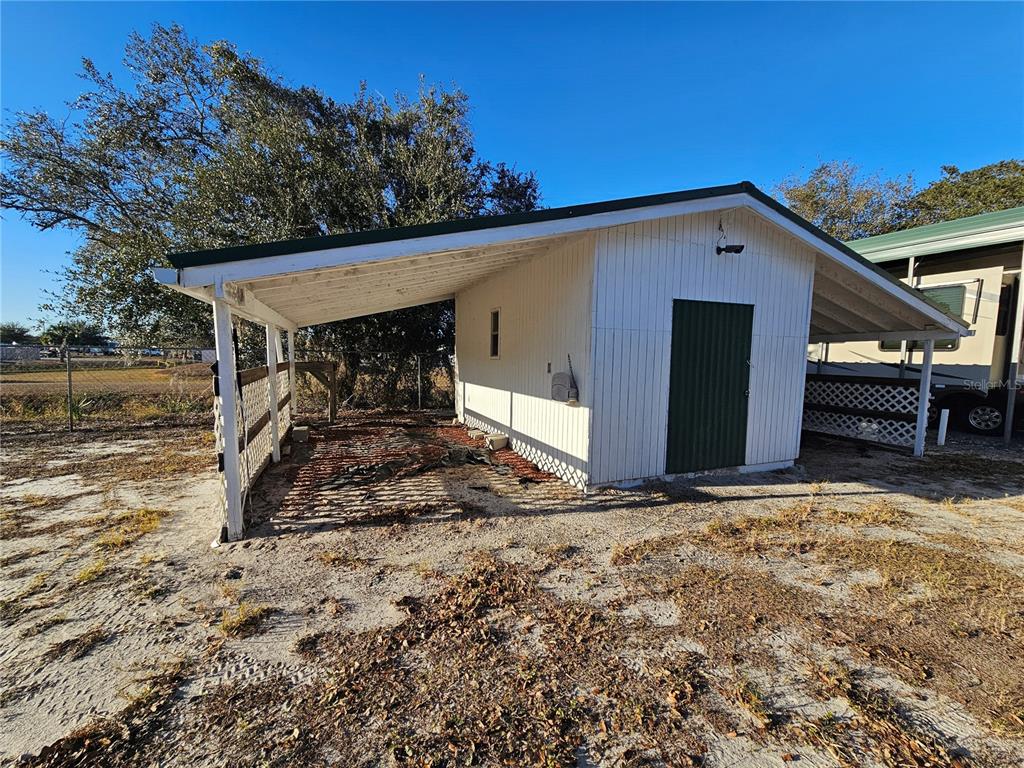 14381 Camp Mack Road Lake Wales, FL 33898 - Photo 29 of 52 a view of a house with a snow in the yard