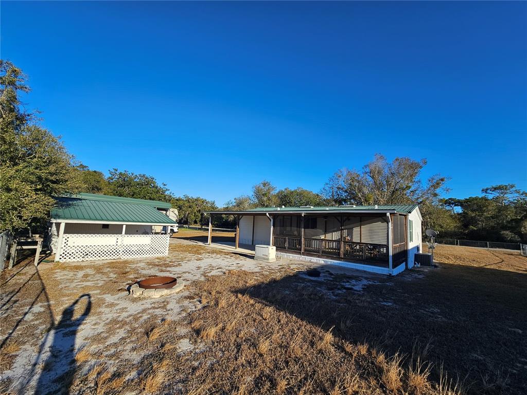 14381 Camp Mack Road Lake Wales, FL 33898 - Photo 32 of 52 a view of a house with a yard
