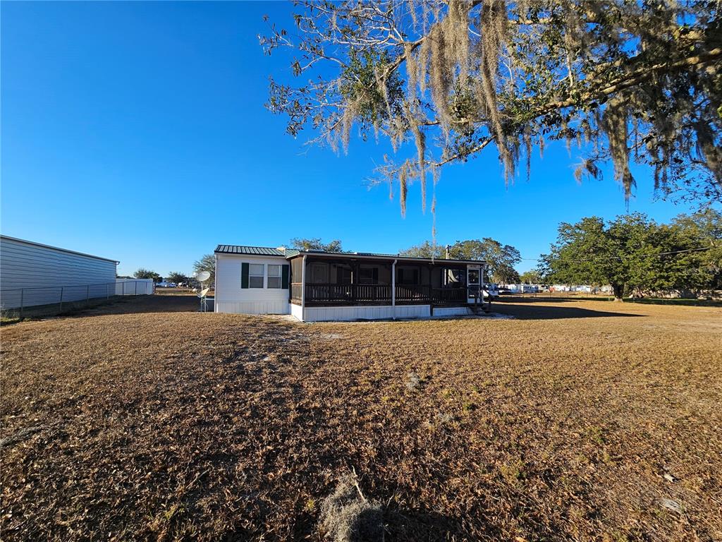 14381 Camp Mack Road Lake Wales, FL 33898 - Photo 34 of 52 a view of a house with a yard
