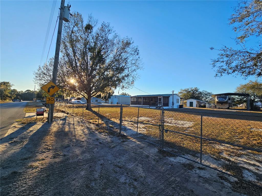 14381 Camp Mack Road Lake Wales, FL 33898 - Photo 51 of 52 a view of street with wooden bridge