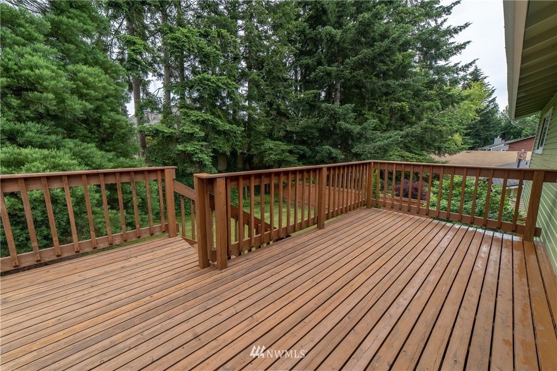 2619 164th Place Southeast Bothell, WA 98012 - Photo 11 of 19 a view of balcony with wooden floor