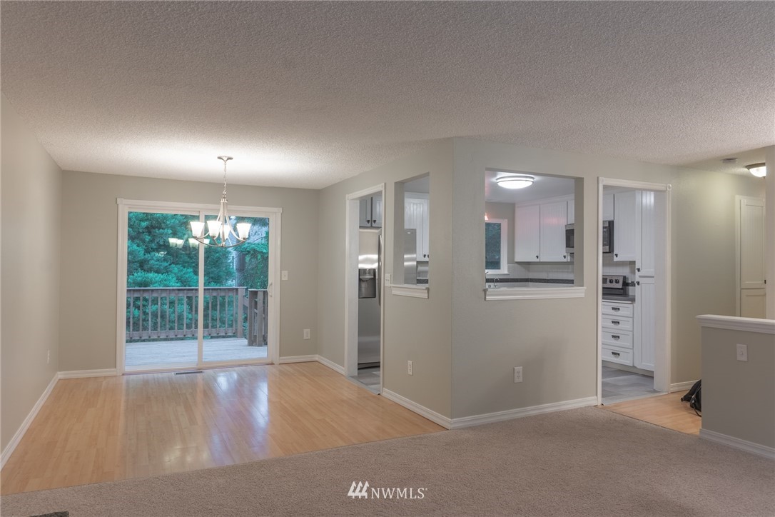 2619 164th Place Southeast Bothell, WA 98012 - Photo 5 of 19 a view of an empty room with a window